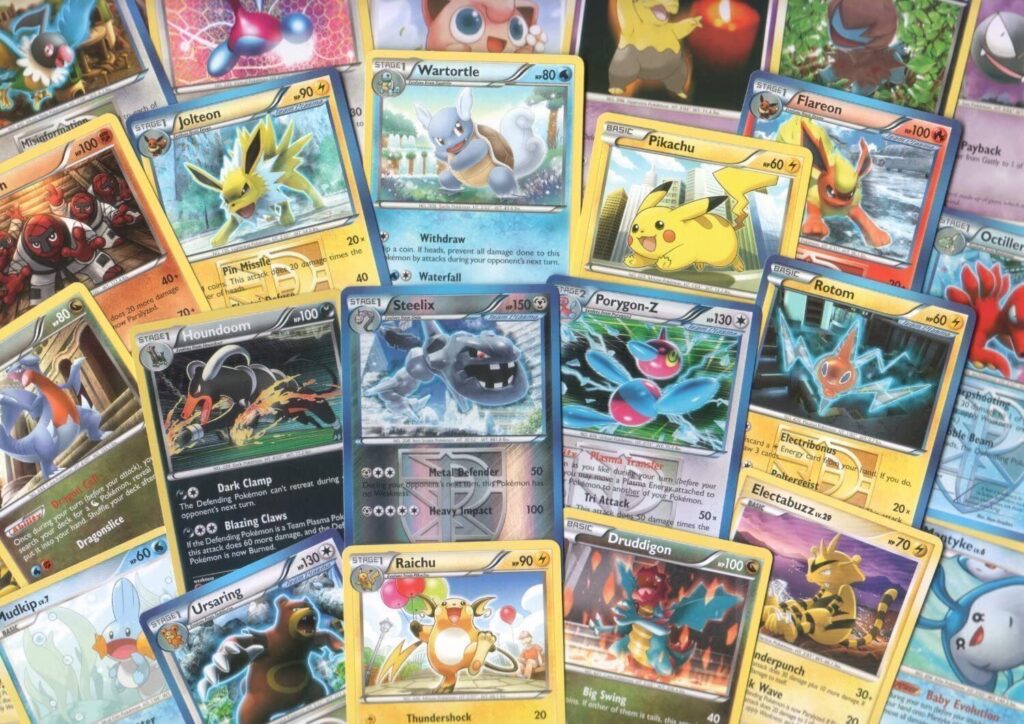 Customer browsing Pokémon cards inside a trading card store in Enterprise, AL.